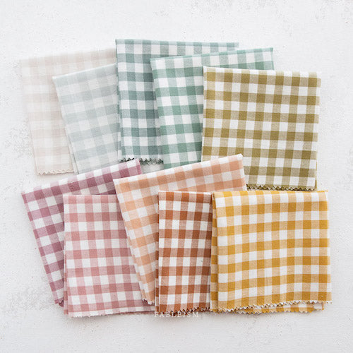 A selection of fat quarter gingham woven fabrics in different colours